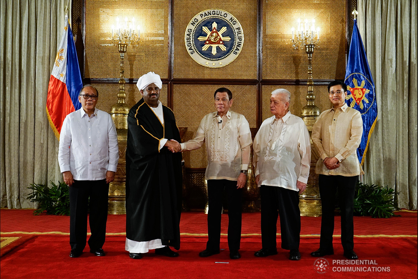 President Rodrigo Roa Duterte poses for posterity with Non-resident Ambassador Designate of Sudan Hamza Omer Hassan Ahmed after the latter presented his credentials to the President during a ceremony at the Malacañan Palace on January 21, 2019. Joining the President are Foreign Affairs Undersecretary Ernesto Abella and Presidential Adviser on Foreign Affairs and Chief of Presidential Protocol Robert Borje. KING RODRIGUEZ/PRESIDENTIAL PHOTO